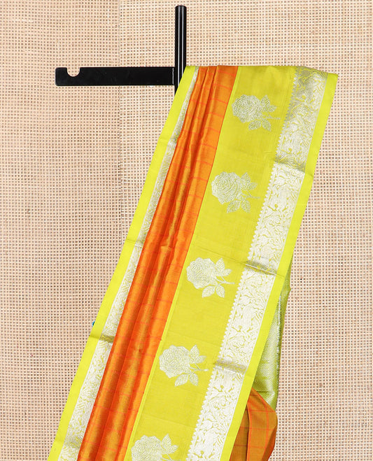 Orange checked Kanchipuram silk saree, contrast border of rose floral, rekku, banaras, and kuthirai designs, and intricate pallu