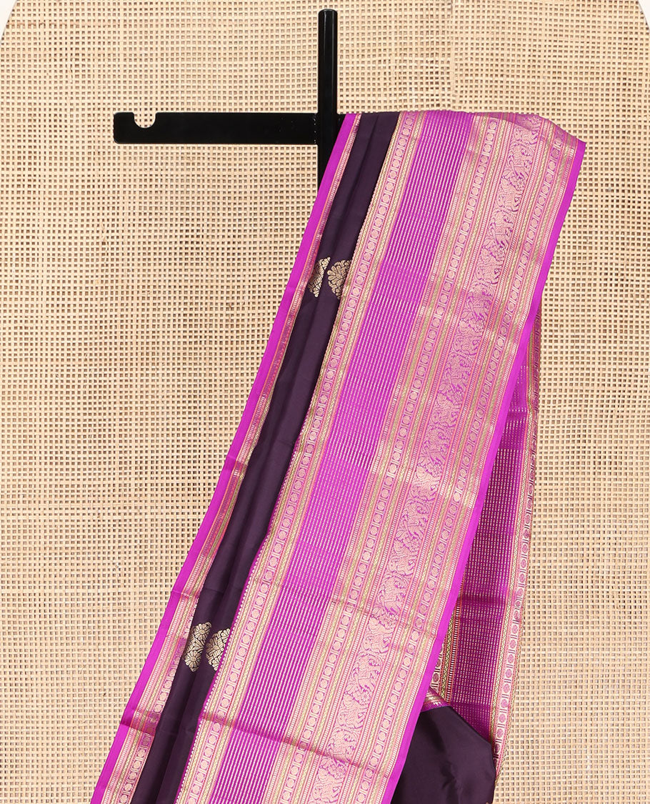 Eggplant Purple Kanchipuram Silk Saree, Adorned with Zari Buttas on Its Body, Complemented by a Contrast Border of Rekku, Neli, Paisa, Muthu, Banaras, Kuthirai, and Yaanai Designs, Grand Jaal Pallu, and Paired with a Contrast Blouse