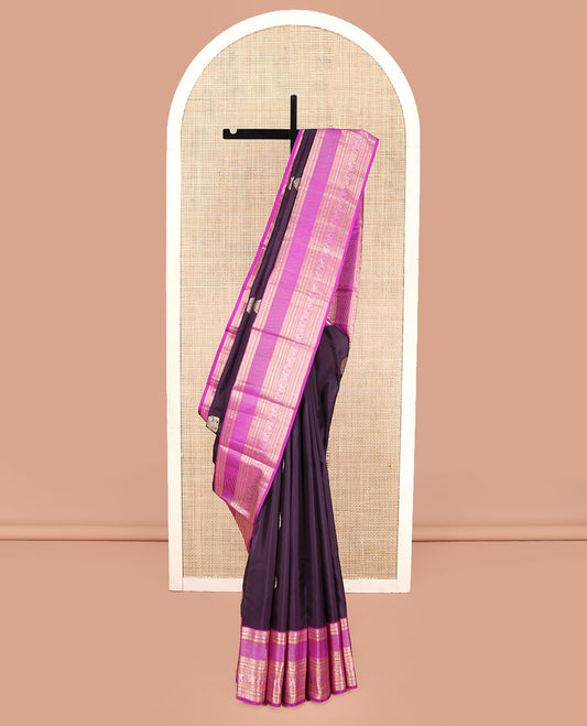 Eggplant Purple Kanchipuram Silk Saree, Adorned with Zari Buttas on Its Body, Complemented by a Contrast Border of Rekku, Neli, Paisa, Muthu, Banaras, Kuthirai, and Yaanai Designs, Grand Jaal Pallu, and Paired with a Contrast Blouse