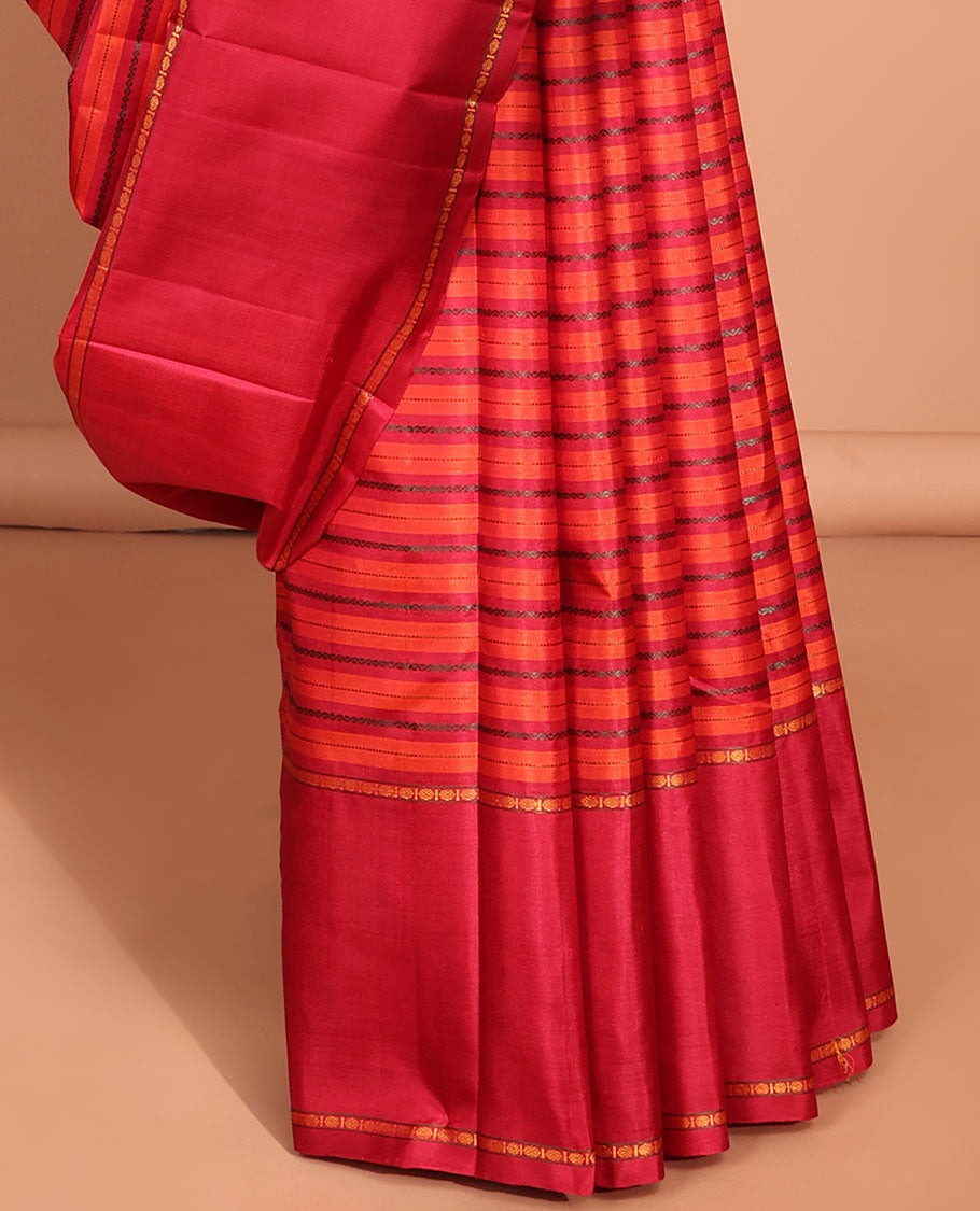 Red striped kancheepuram silk saree  with contrast rettai pettu border & pallu of argyle pattern