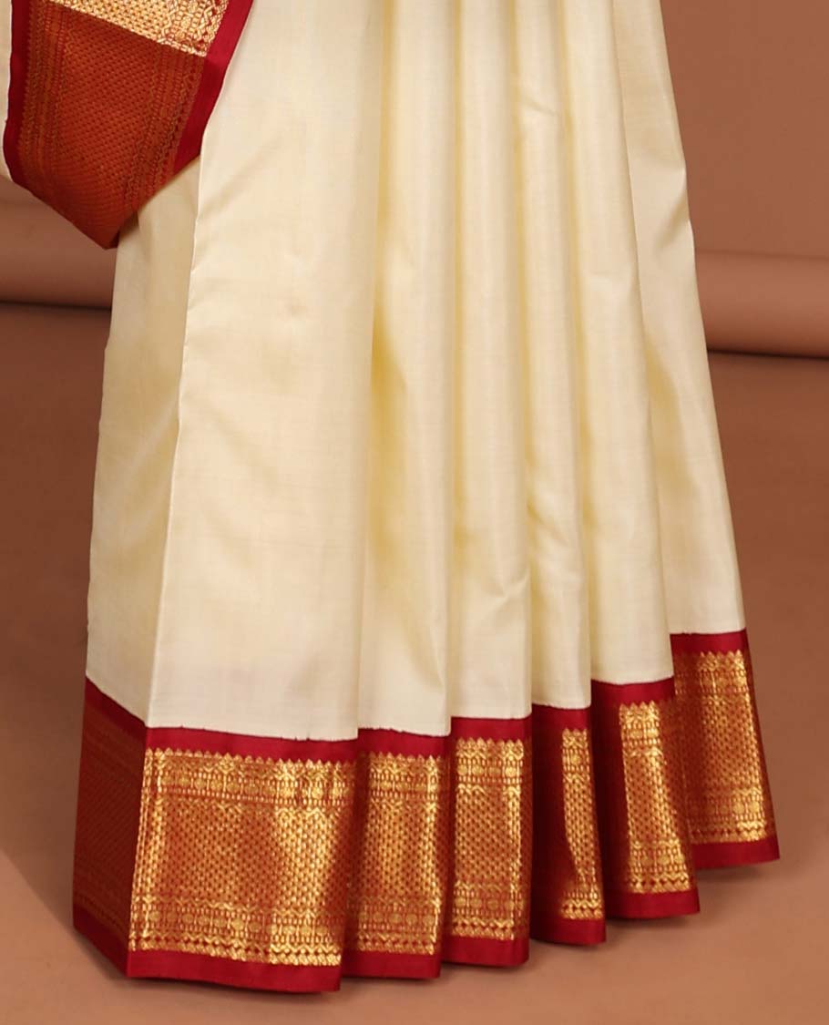 White kancheepuram silk saree with intricate zari design pallu & korvai border of rekku,paun,ara maadam designs