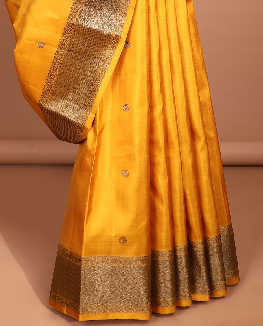Yellow round buttas kancheepuram silk saree with self zari design border & in tricate zari design border