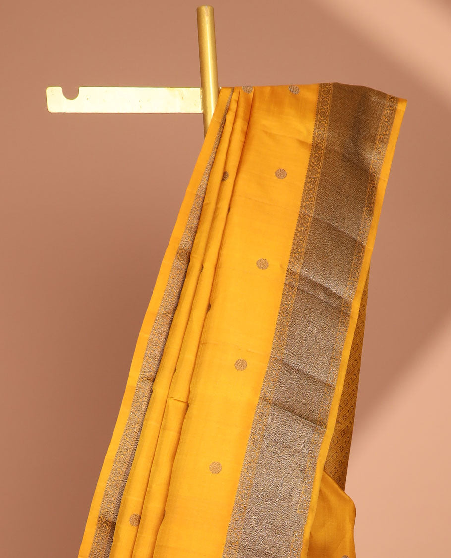 Yellow round buttas kancheepuram silk saree with self zari design border & in tricate zari design border