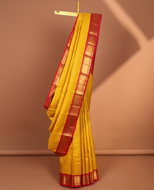 Yellow butta & checks Kanchipuram silksaree, contrast border of Muthu, Banaras,mayil & manga & pallu of mayil,yaali & jaal