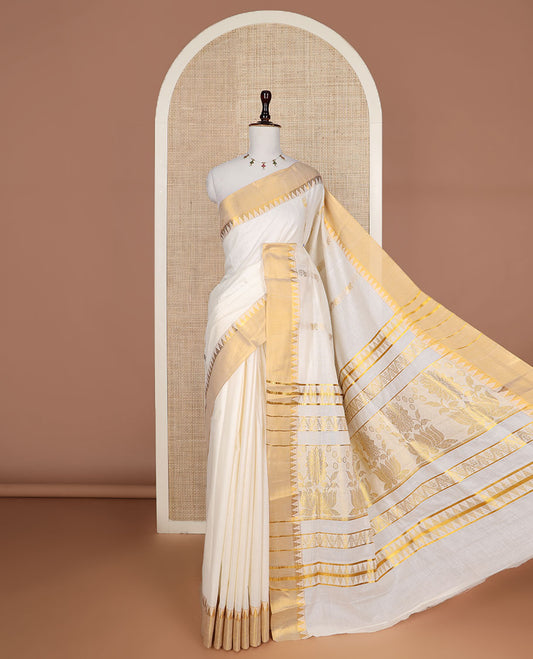 Cream zari design Kerala saree, zari temple border, and pallu of temple and floral designs