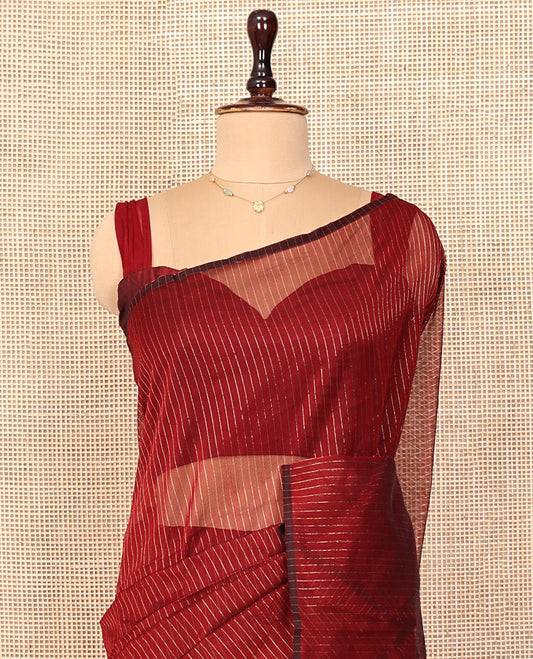Borderless Red Maheshwari Cotton Saree, Subtly Sparkled with Stripes All Over Its Body, Highlighted by Gleaming Zari-Decked-Up Pallu, and Paired with a Matching Blouse