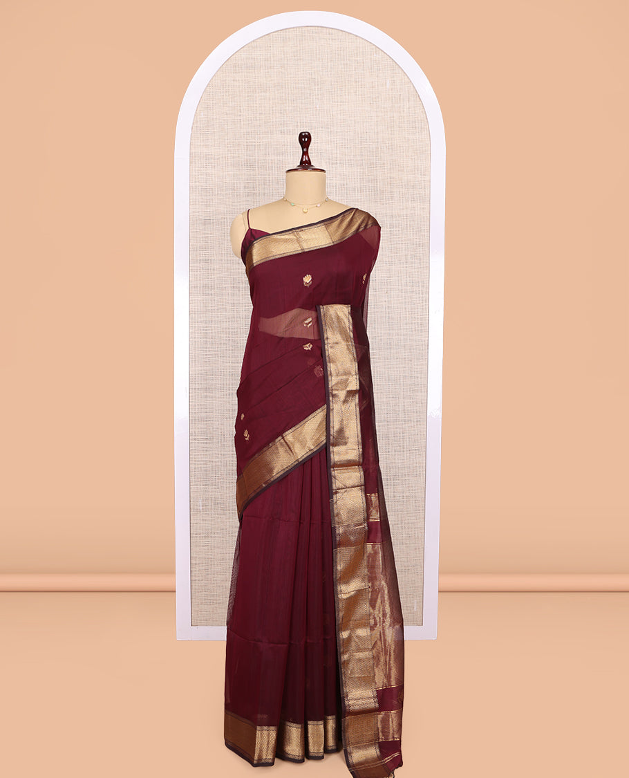 Maroon Maheshwari Cotton Saree, Elevated with Buttas, Highlighted by a Traditional Zari Border, Zari Gleamed Up Pallu, and a Matching Blouse