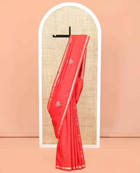 Red Mayuri Soft Silk Saree, Gleamed Up with Zari Buttas All Over Its Body, Subtle Zari Piping Border, Pallu of Geometric Designs, and Paired with a Matching Blouse
