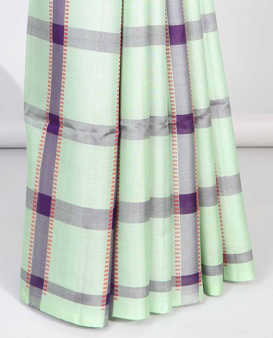 Borderless green checked soft silk saree with intricate zari design pallu