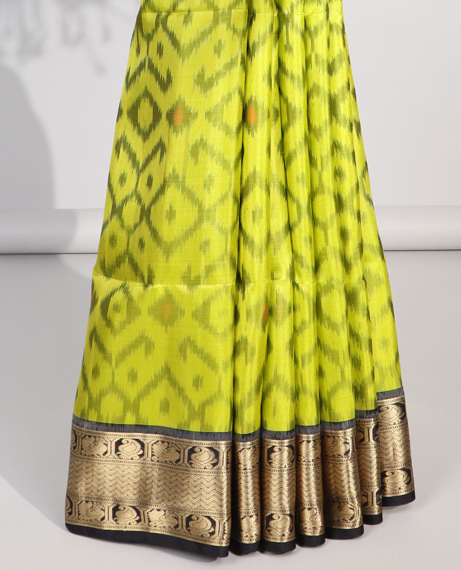 yellow ikkat style floral design soft silk saree with contrast zari border & traditional zari design pallu