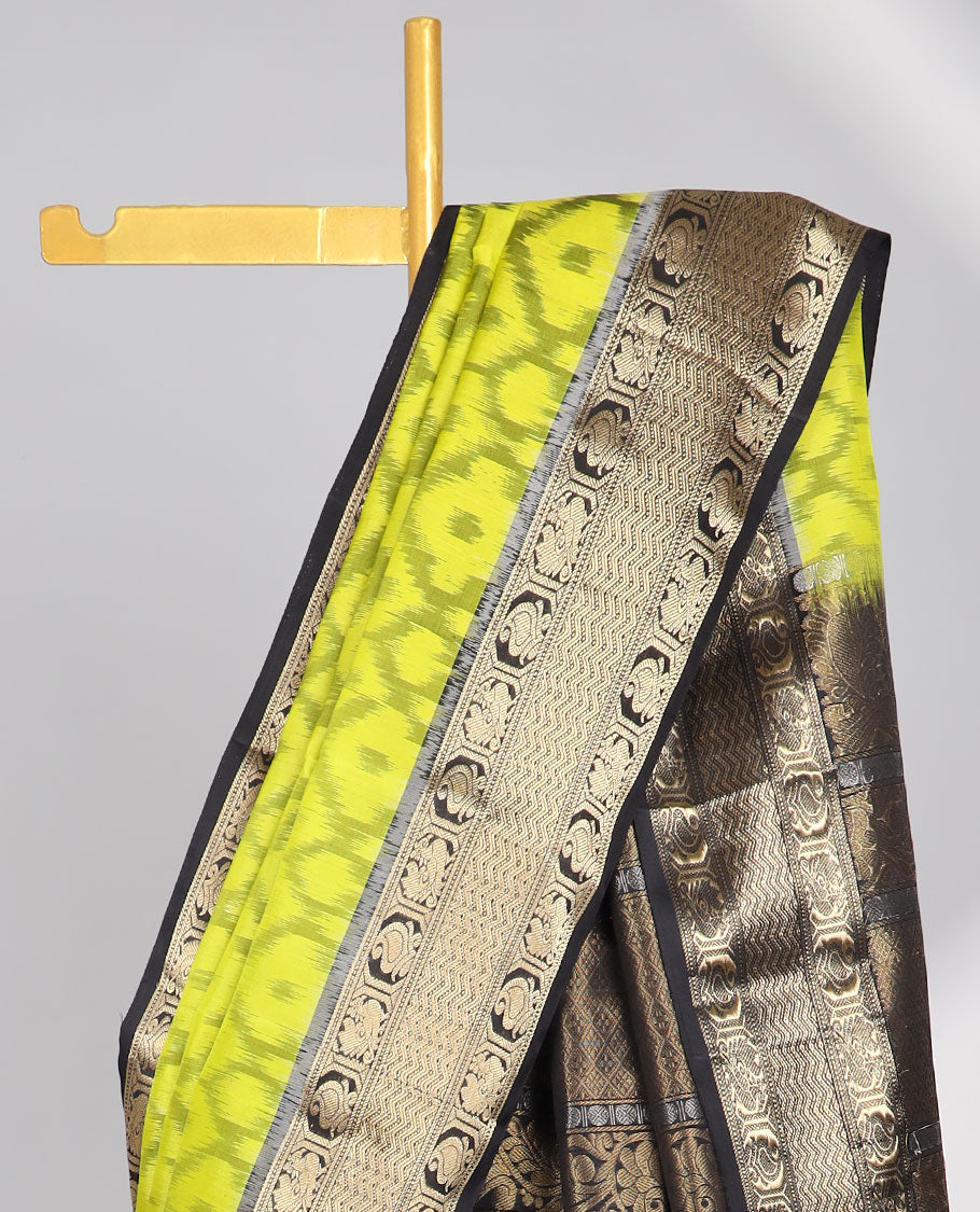 yellow ikkat style floral design soft silk saree with contrast zari border & traditional zari design pallu
