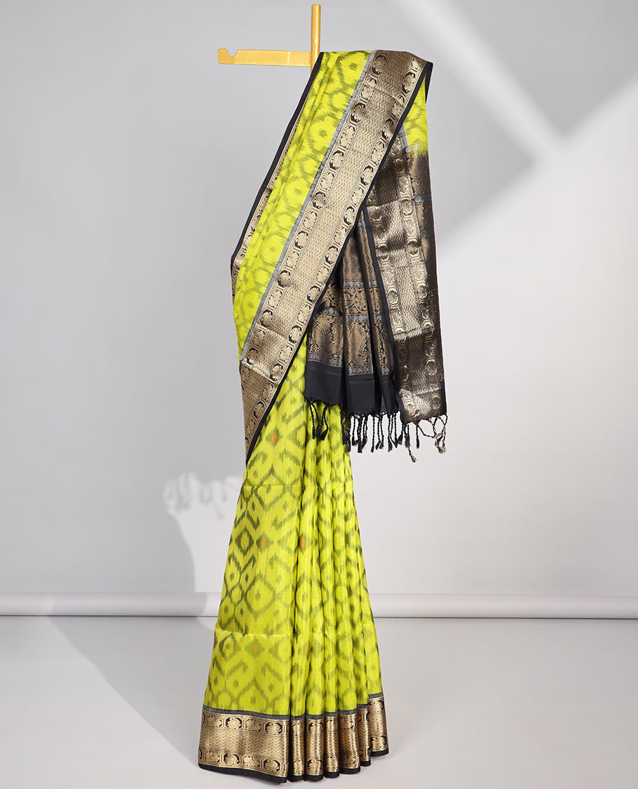 yellow ikkat style floral design soft silk saree with contrast zari border & traditional zari design pallu