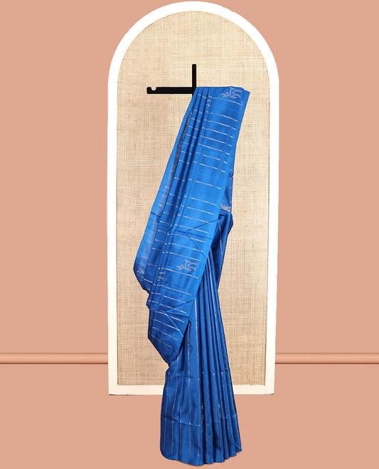 Borderless Blue Mayuri Soft Silk Saree, Adorned with Zig-Zag Stripes and Deer Buttas, a Pallu of Coconut Tree Designs, and a Matching Blouse
