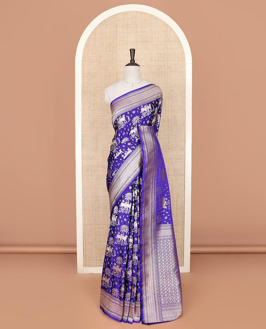 Blue zari buttas and Pichwai cow buttas mushru silk saree, traditional design border, and zari-rich jaal pallu