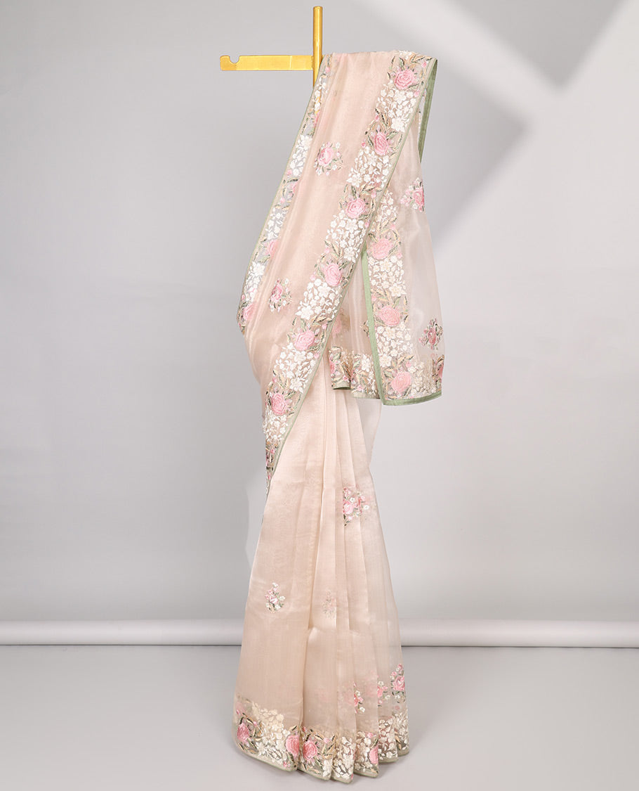 Pastel pink floral motifs embroidered semi-banaras organza saree & floral embroidered border