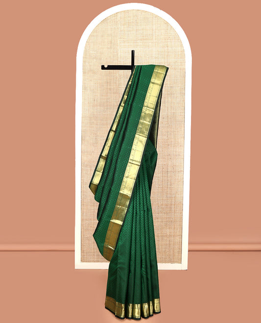 Green Embossed Parampara Silk Saree, Elevated with Zari Border of Thilakam, Mayil, Yaanai, Mayil Kann, and Manga Designs, Grand Jaal Pallu and Paired with a Matching Blouse