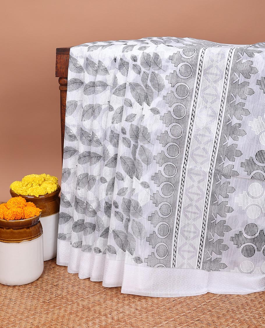 white all over leaf printed mixed cotton saree with printed pallu & plain blouse