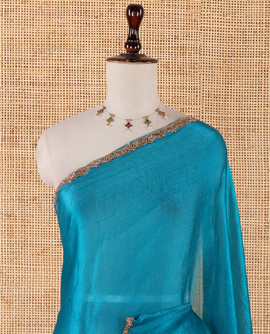 Rama blue fendy chiffon saree with hand work border & self pallu along with hand work blouse