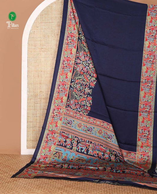 Navy blue plain gajji silk saree, double-sided position printed border & pallu of animal & human motifs, with floral printed blouse