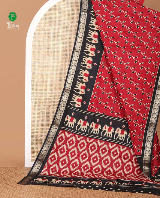 Red floral vine printed Assam cotton saree,contrast border of ikat elephant print & zari peacocks,ikat jaal pallu & ikat print blouse