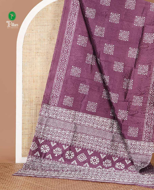 Purple batik buttas printed litchi crushed saree, batik-printed border, printed pallu & printed blouse