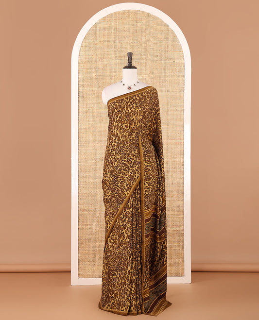 Khaki brown leopard-skin-like printed crepe silk saree, plain piping border, geometric motif printed pallu & animal-skin print blouse