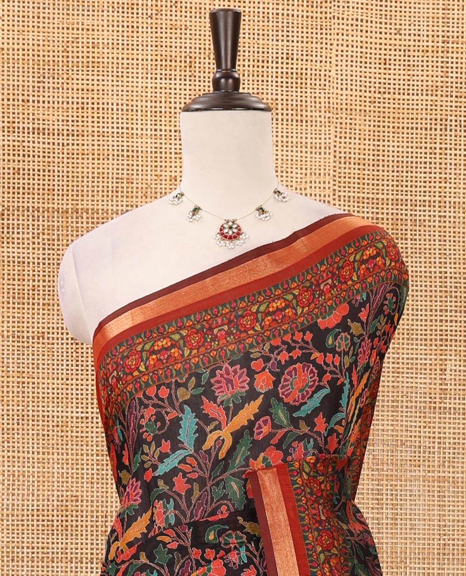Black-base multi-hued floral vine printed viscose muslin saree, contrast zari piping border,print pallu & floral motifs print blouse