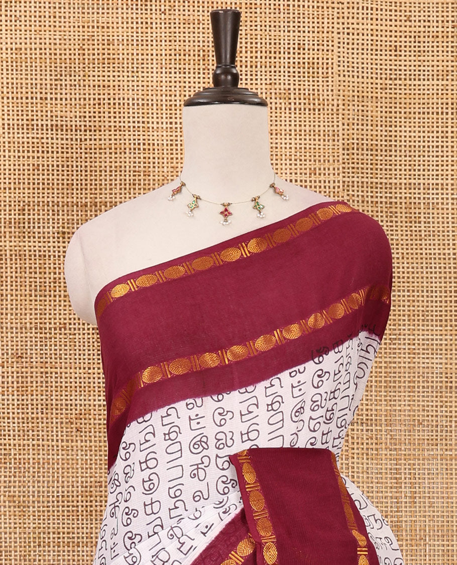 White-purple Tamil letters printed Sungudi cotton saree, contrast rudraksham rettai pettu zari border, striped pallu & contrast veldhari striped blouse