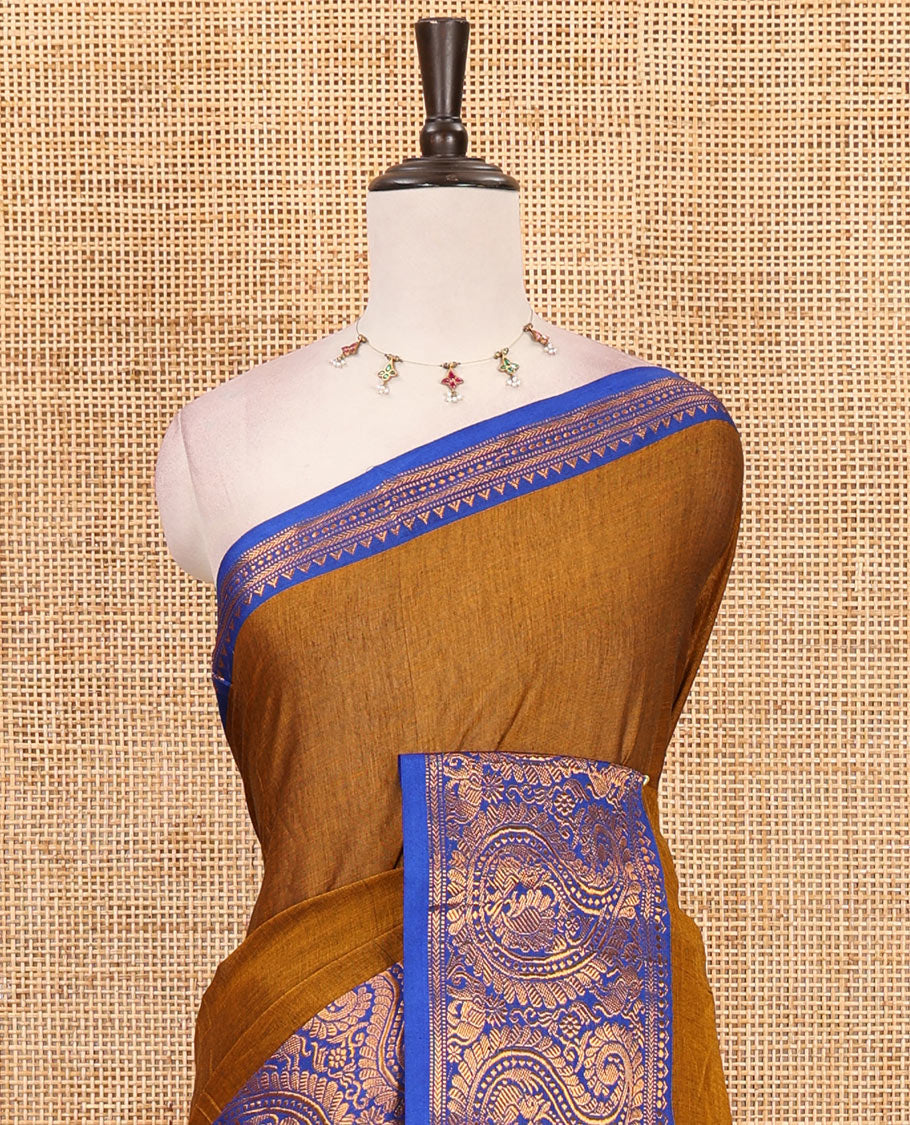 Brown plain design mercerised cotton saree, contrast traditional peacock enclosed manga border, striped pallu & matching blouse