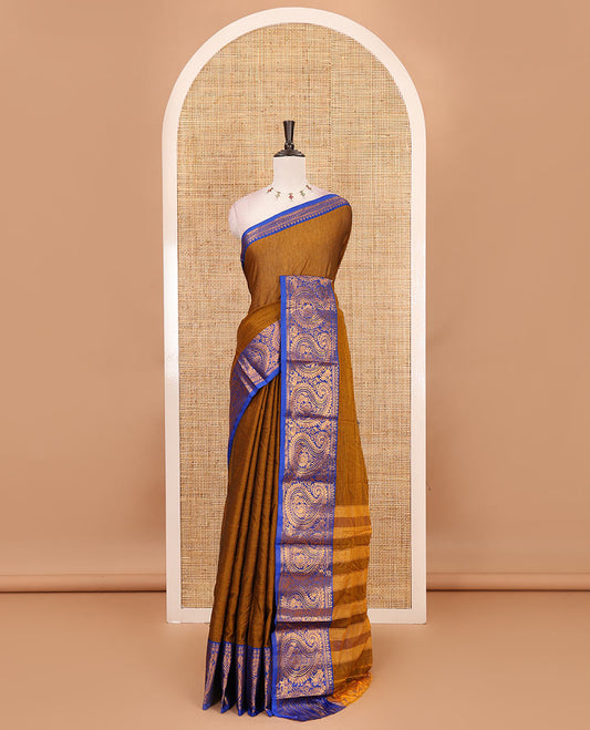 Brown plain design mercerised cotton saree, contrast traditional peacock enclosed manga border, striped pallu & matching blouse