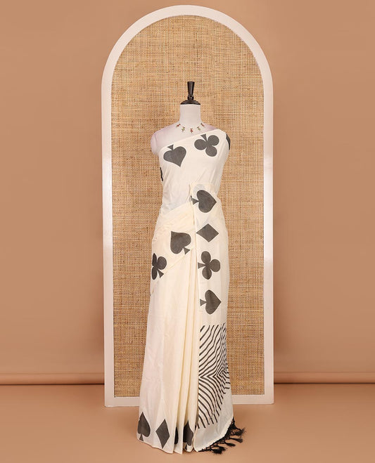 Cream-black plain Kerala cotton saree, contrast color cards-theme printed border of Diamonds, Clubs, and Spades, leheriya-striped pallu, and plain blouse