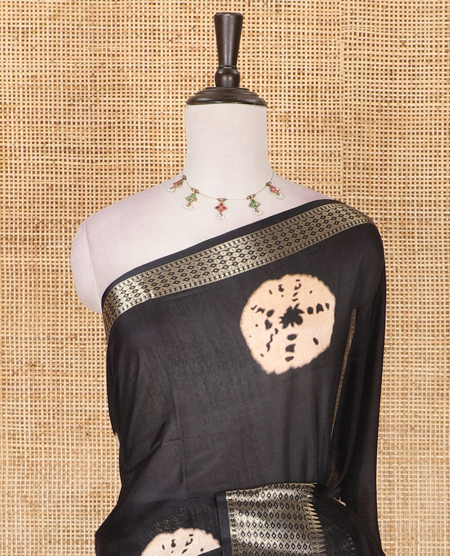 Black shibori printed dola silk saree, traditional zari border, printed pallu, and blouse of print, and zari work
