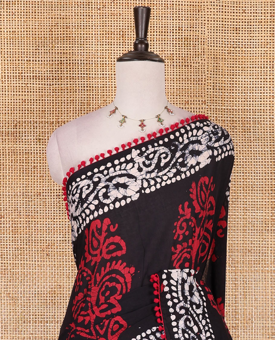 Black-Maroon batik floral printed soft cotton saree, batik printed pom-pom tasseled border, batik floral printed pallu, and a matching blouse