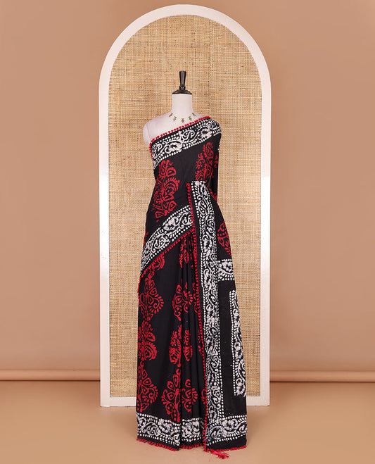 Black-Maroon batik floral printed soft cotton saree, batik printed pom-pom tasseled border, batik floral printed pallu, and a matching blouse
