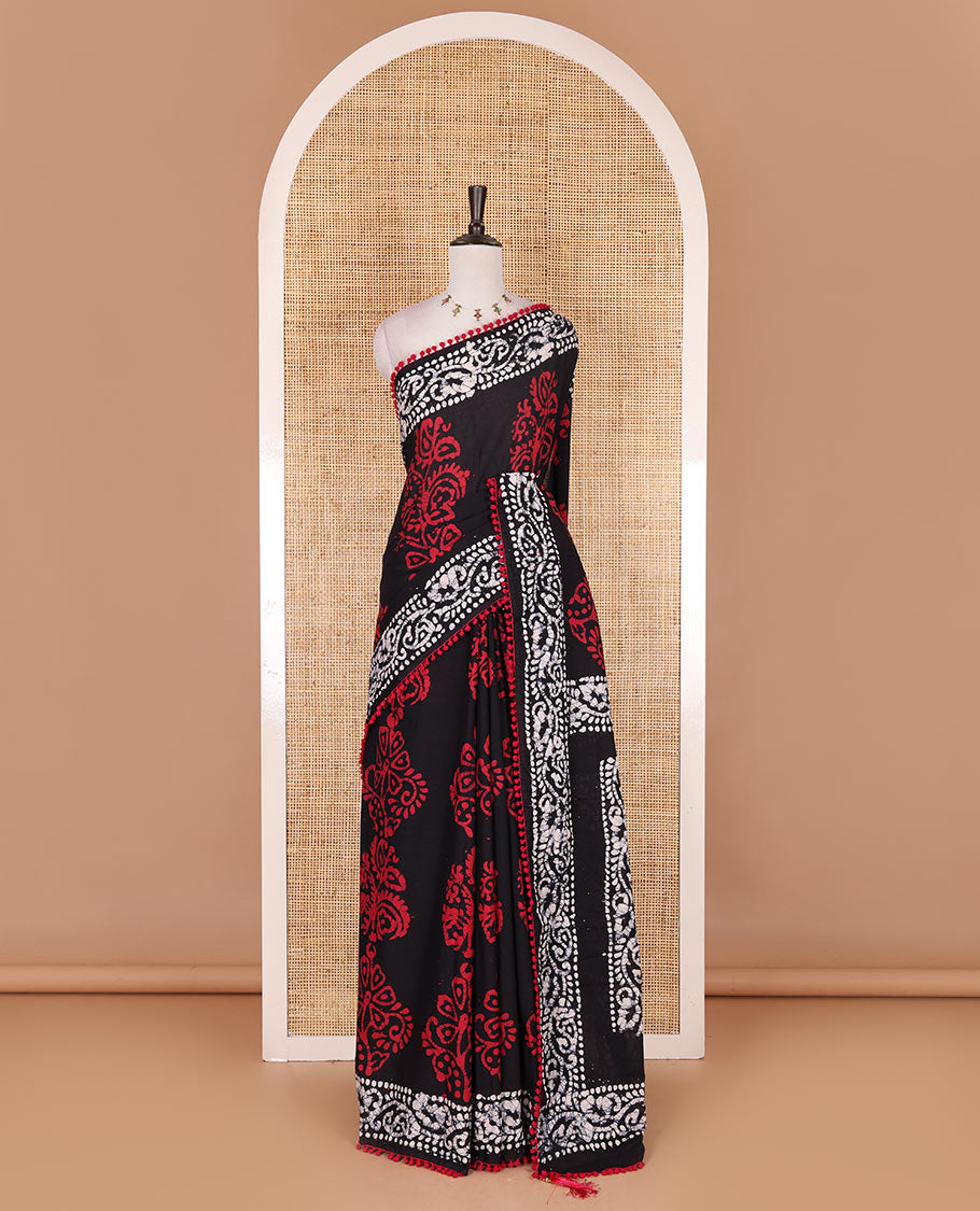 Black-Maroon batik floral printed soft cotton saree, batik printed pom-pom tasseled border, batik floral printed pallu, and a matching blouse