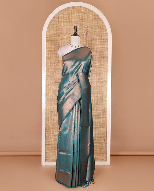 Rama green paisley zari jacquard Kanchi tissue saree, zari border, pallu steeped with paisleys, and jacquard matching blouse