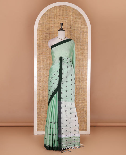 Green triangle motifs mercerised cotton saree, contrast plain border, striped pallu, and matching triangle motifs blouse