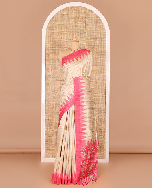 Chikku-pink plain Khicha katan silk saree, contrast pink temple border, ikkat printed pallu with tassels, and a contrast blouse