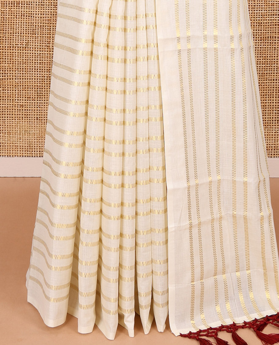 Borderless cream and maroon horizontal muthu zari striped Kerala cotton saree, self-pallu with tassels, and a matching blouse