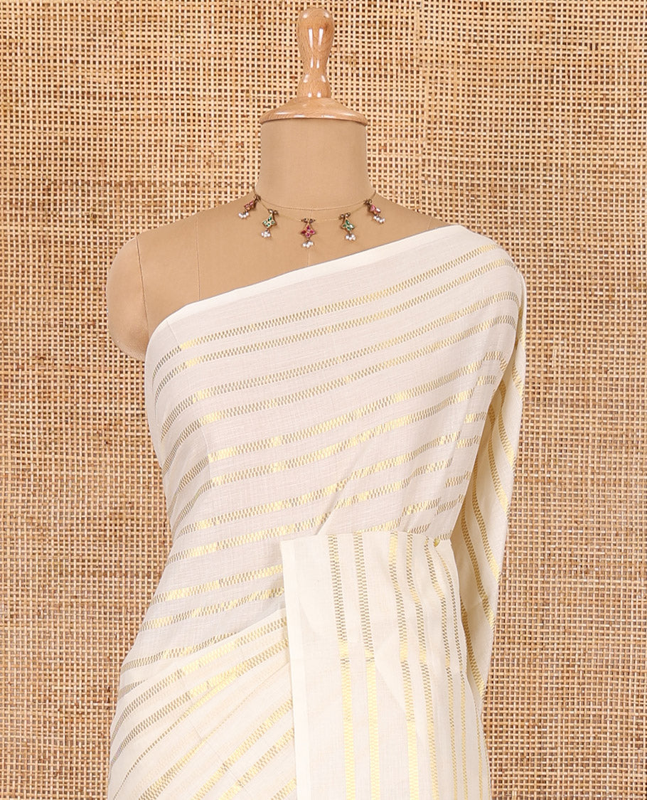 Borderless cream and maroon horizontal muthu zari striped Kerala cotton saree, self-pallu with tassels, and a matching blouse