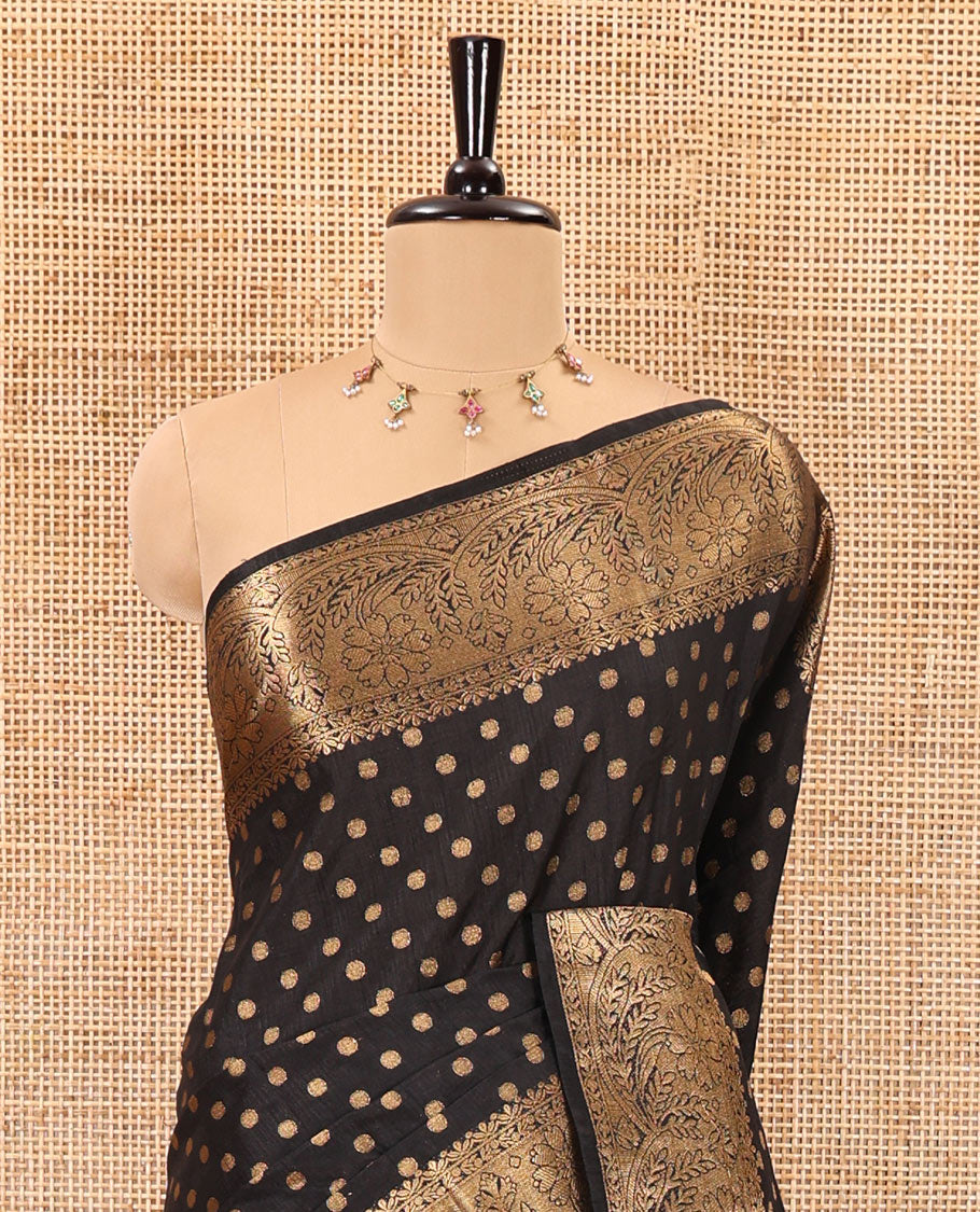 Black zari buttas woven semi tussar saree, zari intricate floral design border, zari-rich intricate pallu, and a plain blouse