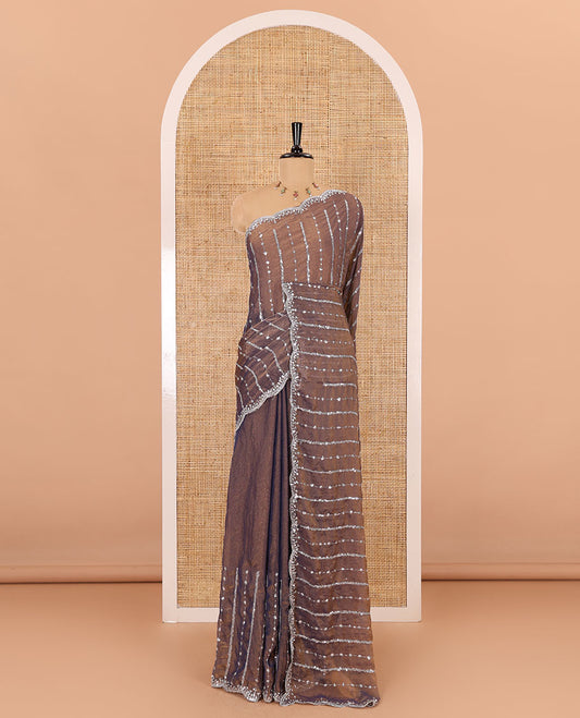 Navy blue vertical stripes embroidered shimmer chiffon saree, scallop embroidered border, embroidered pallu, and fancy embroidered matching blouse