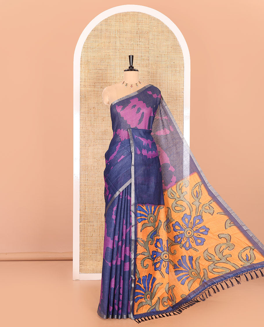 Navy blue shibori printed linen cotton saree, piping border, contrast floral printed pallu, and a contrast floral printed blouse