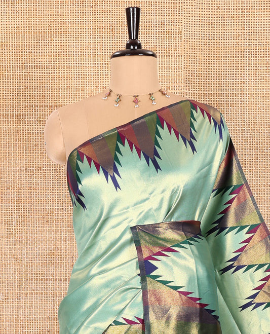 Gleaming Green Plain Khadi Tissue Silk Saree Featuring a Contrast Tissue Temple Border, Grand Pallu of Zari Jaal Design, and Paired with a Contrast Blouse of Zari Buttas