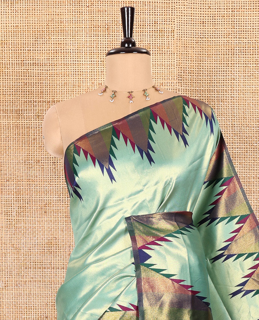 Gleaming Green Plain Khadi Tissue Silk Saree Featuring a Contrast Tissue Temple Border, Grand Pallu of Zari Jaal Design, and Paired with a Contrast Blouse of Zari Buttas