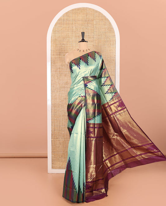 Gleaming Green Plain Khadi Tissue Silk Saree Featuring a Contrast Tissue Temple Border, Grand Pallu of Zari Jaal Design, and Paired with a Contrast Blouse of Zari Buttas