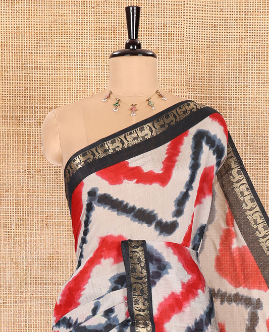 Red Muslin Cotton Saree Elevated with Zig-Zag Shibori Patterns Prints, Complemented by a Contrast Border of Deer Motifs in Zari, Pallu Decked Up with Scenery Print, and Paired with a Contrast Polka Dots Printed Blouse