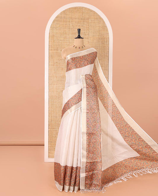 Cream Plain Tissue Saree Adorned with Contrasting Kaleidoscopic-colored Painting-Style Figurines Printed Border, Painting-Style Printed Pallu, and a Contrast Plain Blouse