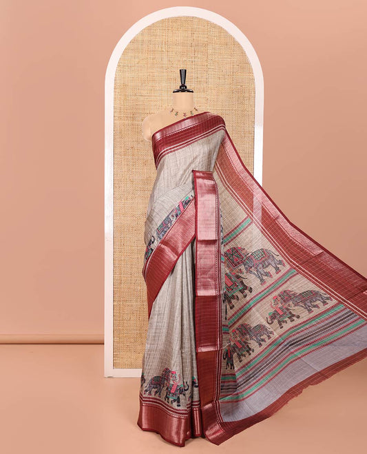 Grey and Maroon Dola Silk Saree Subtly Designed with Checks and Elephant Motifs Print, Complemented by a Contrast Traditional Zari Design Border, Pallu Depicting Elephant Motifs Print, and Paired with a Contrast Blouse