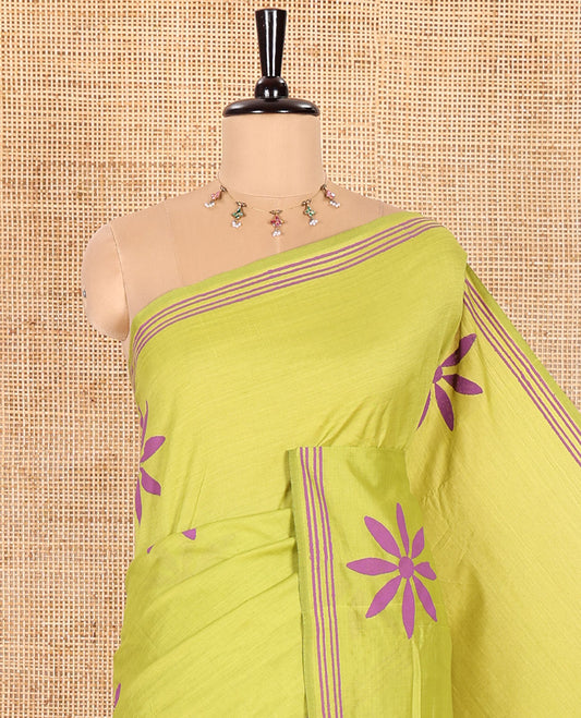 Parrot Green South Cotton Saree, Beautified with Multi-Petal Flower Motifs Printed All Over Its Body, Subtly Striped Border, and Comes with One Matching Blouse, and One Contrast Block Printed Blouse